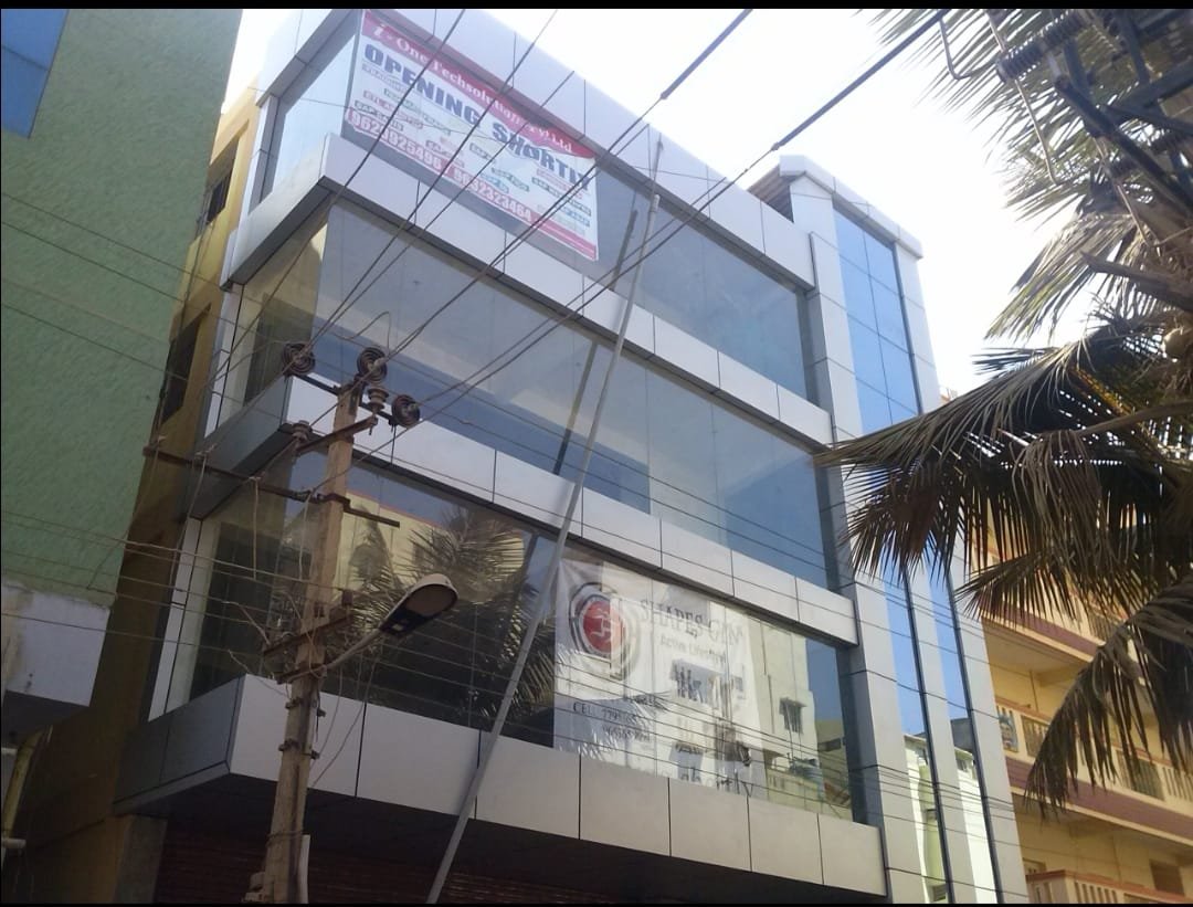 Contemporary Office Complex Architecture, exterior works by Dhrithi Infra