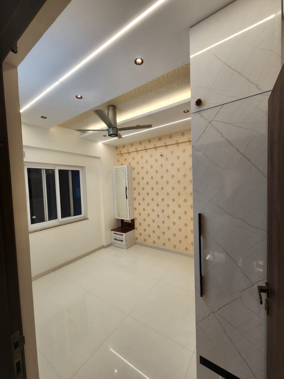 Green Glossy Modular Kitchen Interior, interiors by Dhrithi Infra