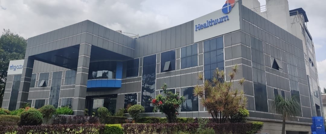 Healthcare Building Facade Design, exterior works by Dhrithi Infra