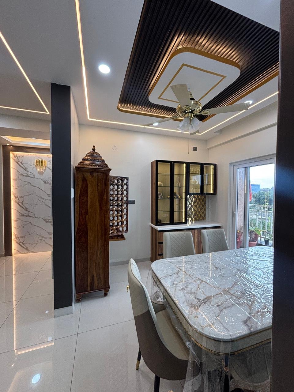 Luxury Living Room Feature Wall, interiors by Dhrithi Infra