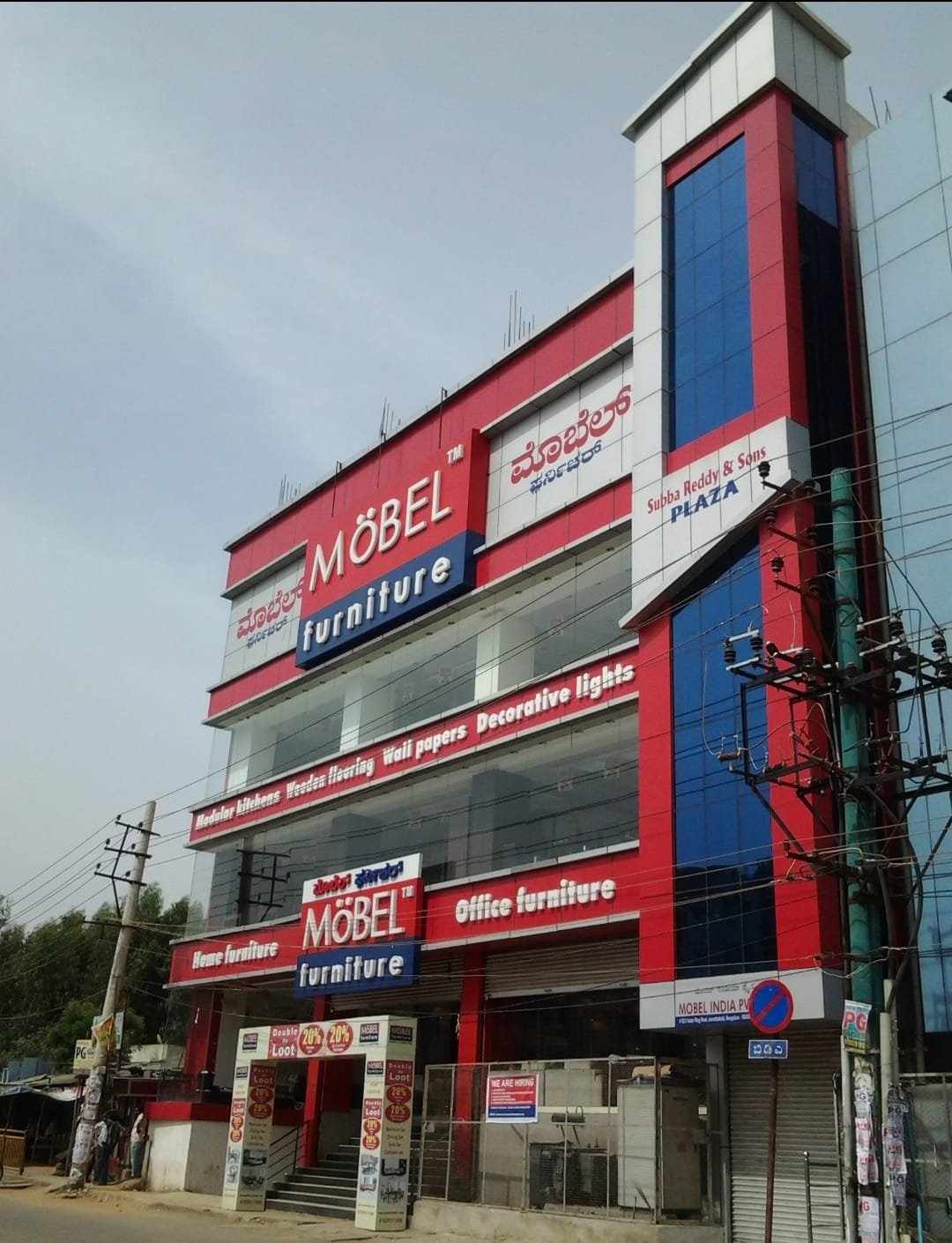 Modern Business Center Glass Facade, exterior works by Dhrithi Infra