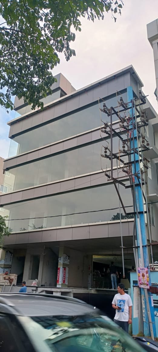 Modern Commercial Building Exterior Design, exterior works by Dhrithi Infra