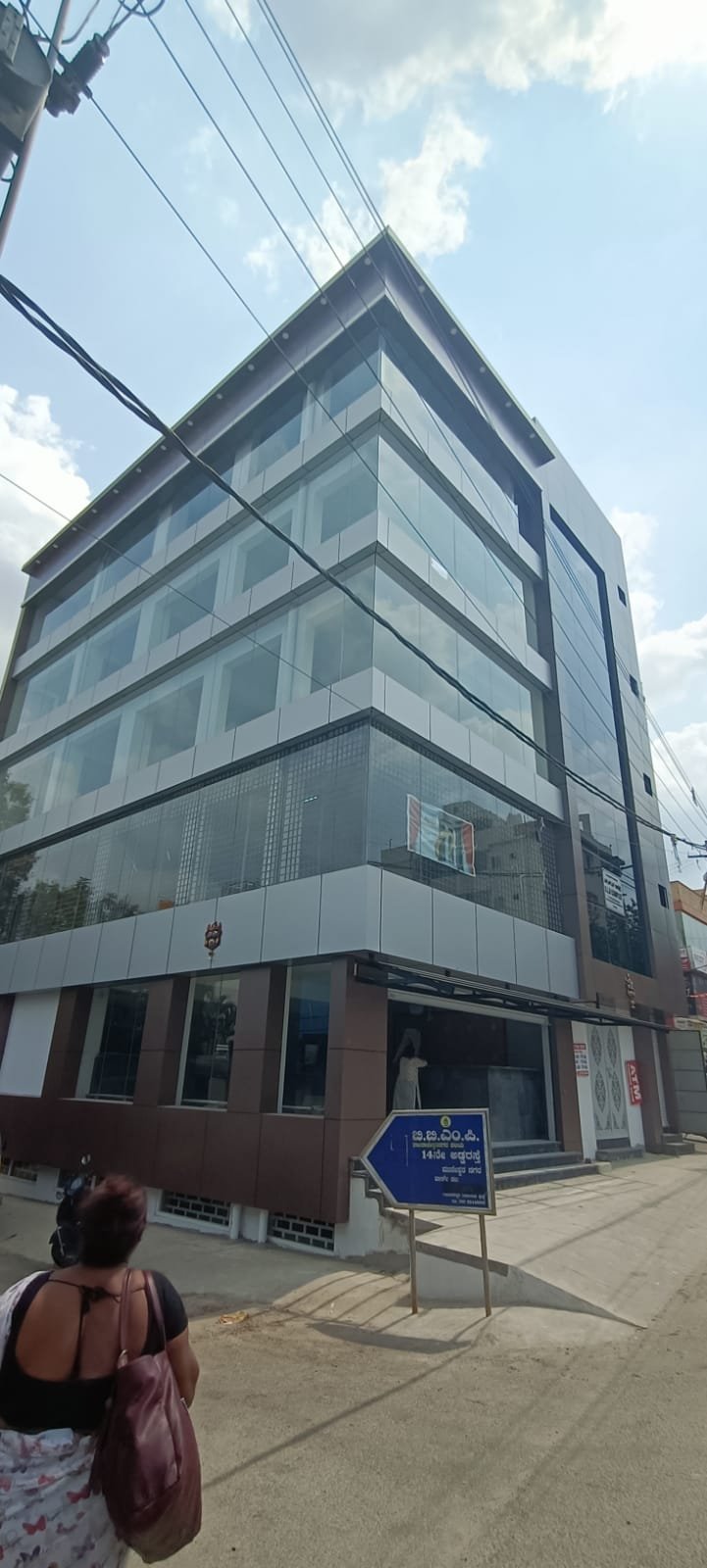 Modern Corporate Office Building Exterior, exterior works by Dhrithi Infra