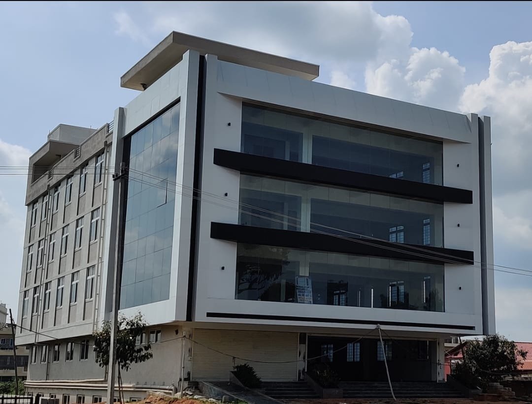 Modern Glass Canopy Architectural Detail, exterior works by Dhrithi Infra