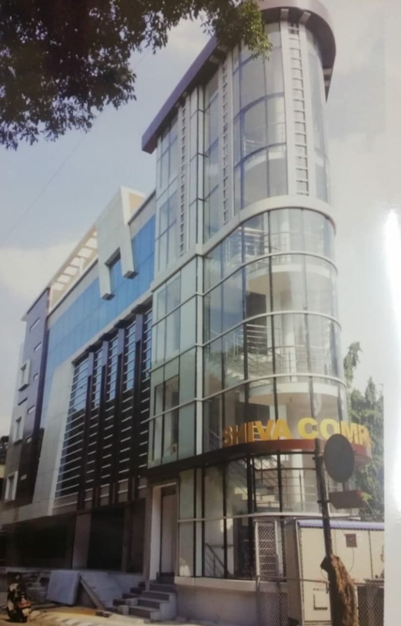 Multi Storey Commercial Building Facade, exterior works by Dhrithi Infra