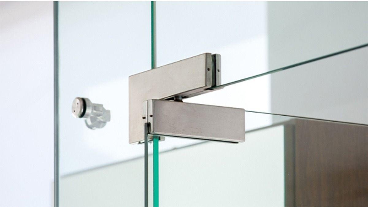 Stainless steel patch fittings on frameless glass