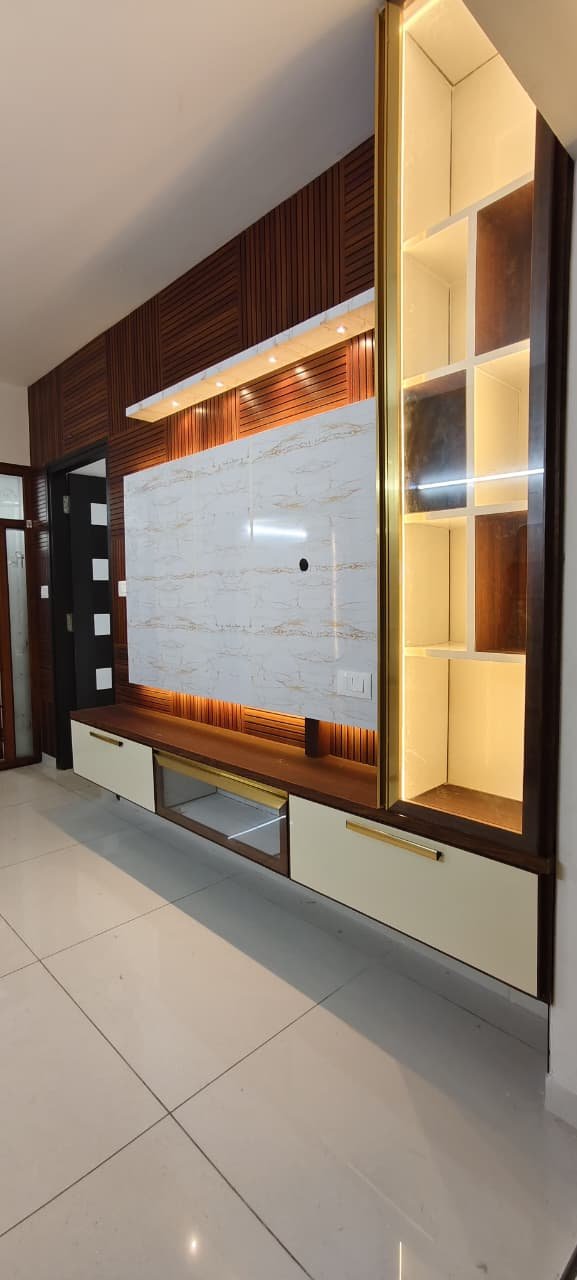 Premium Wooden TV Back Panel with LED Lighting, aluminium interiors by Dhrithi Infra