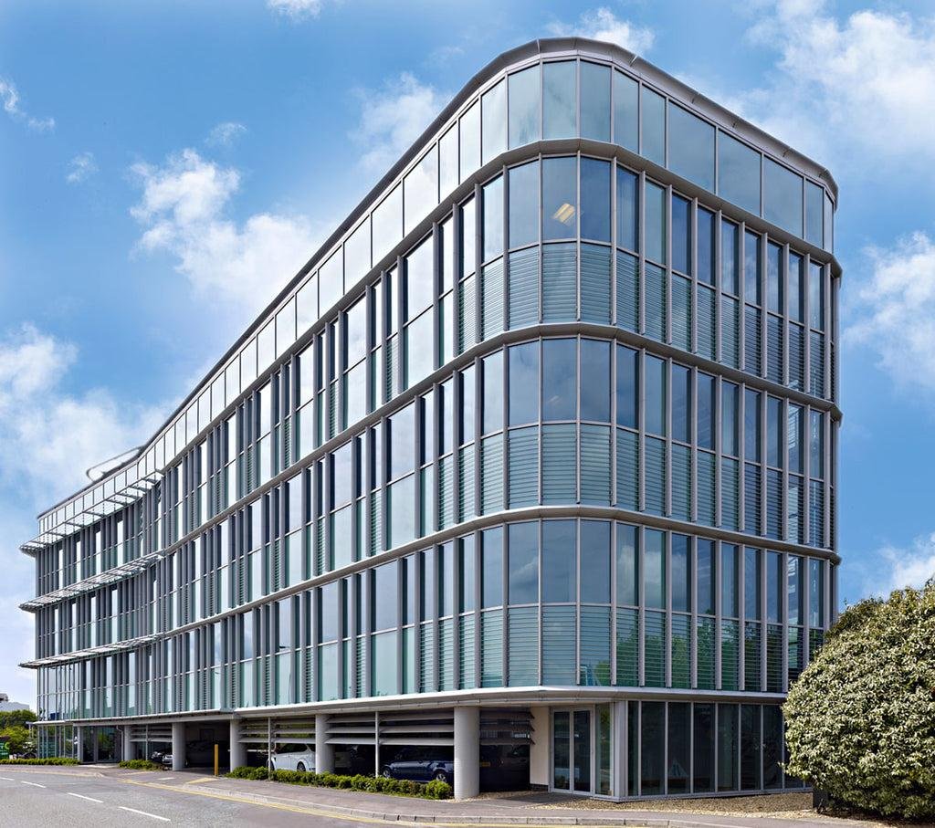 Semi-unitized glazing bays