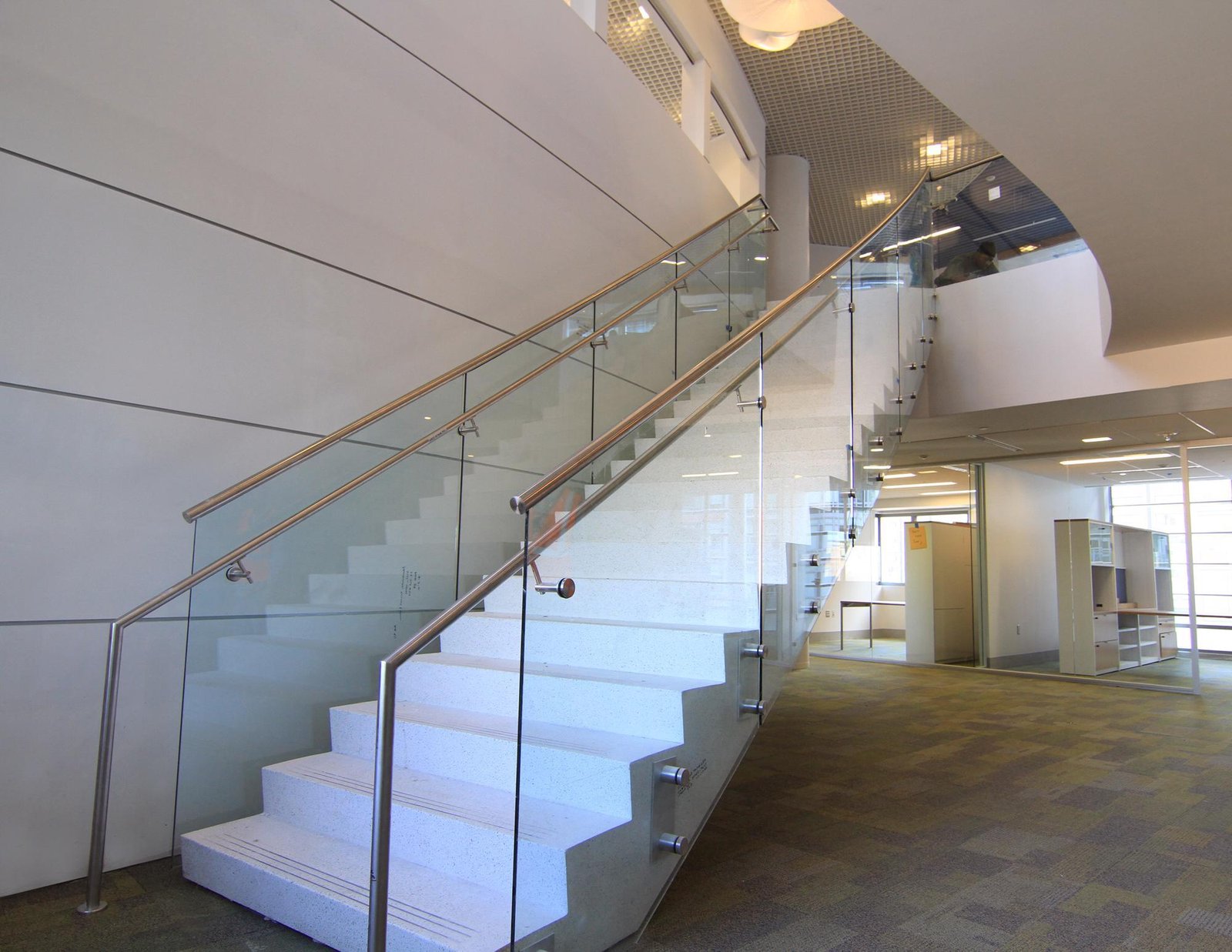 Staircase SS railing with glass infill