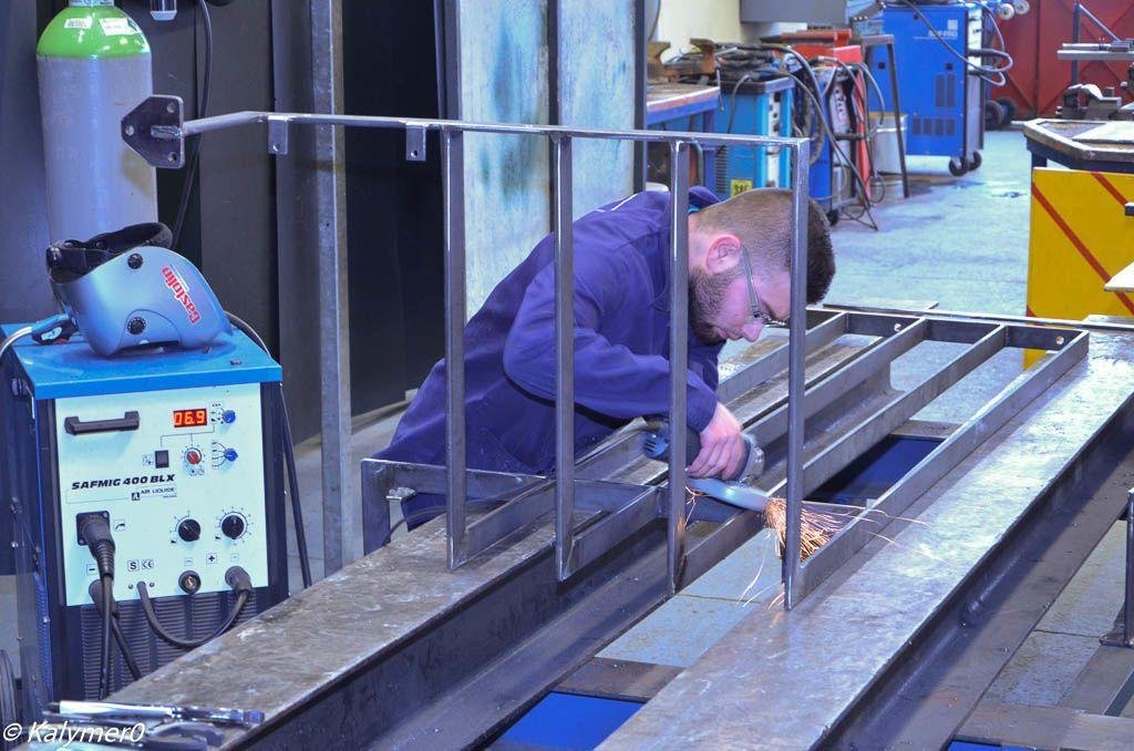 Railing joints welded and ground back