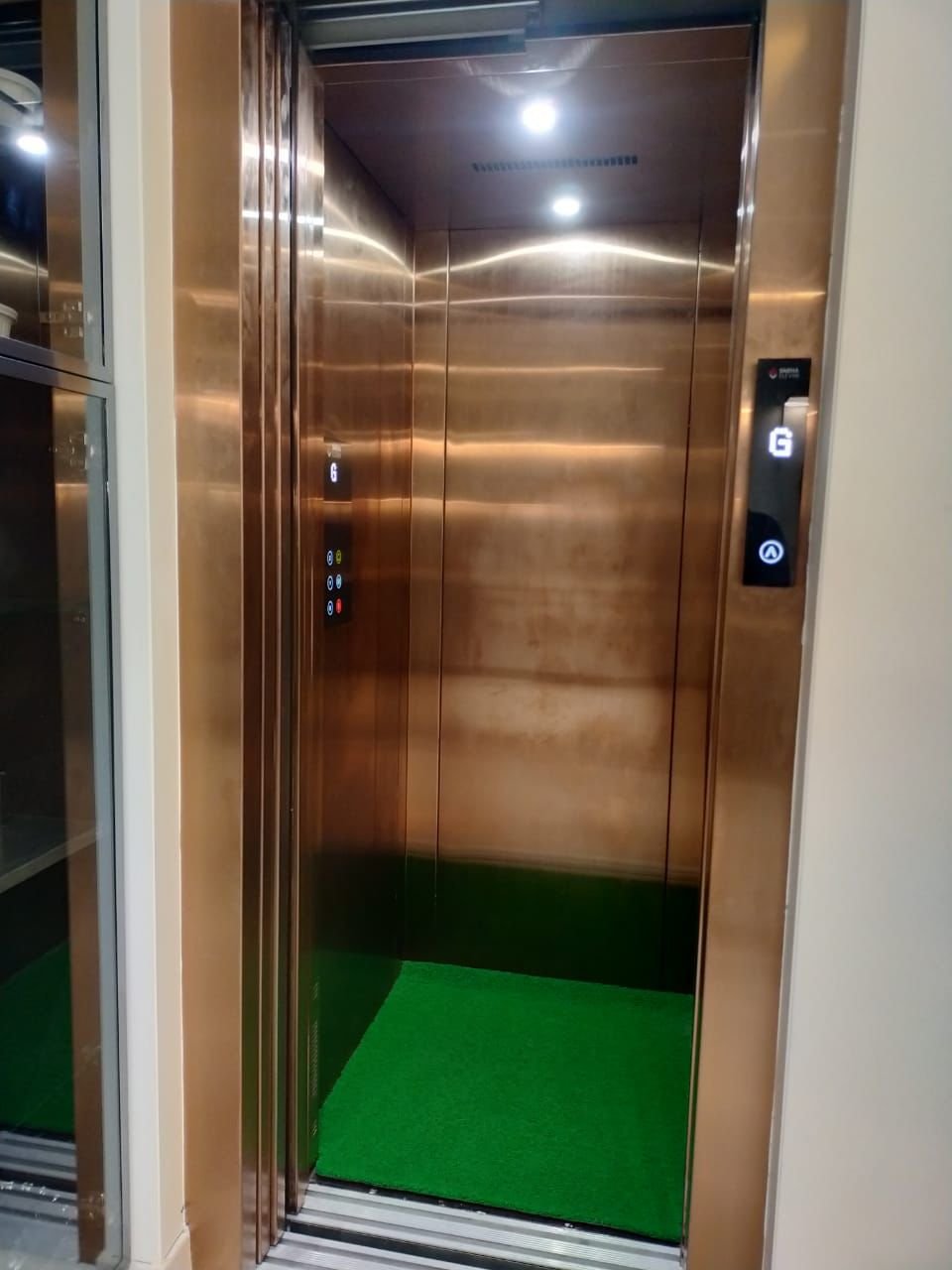 Custom Copper Finish Bungalow Lift Design, home lifts by Dhrithi Infra