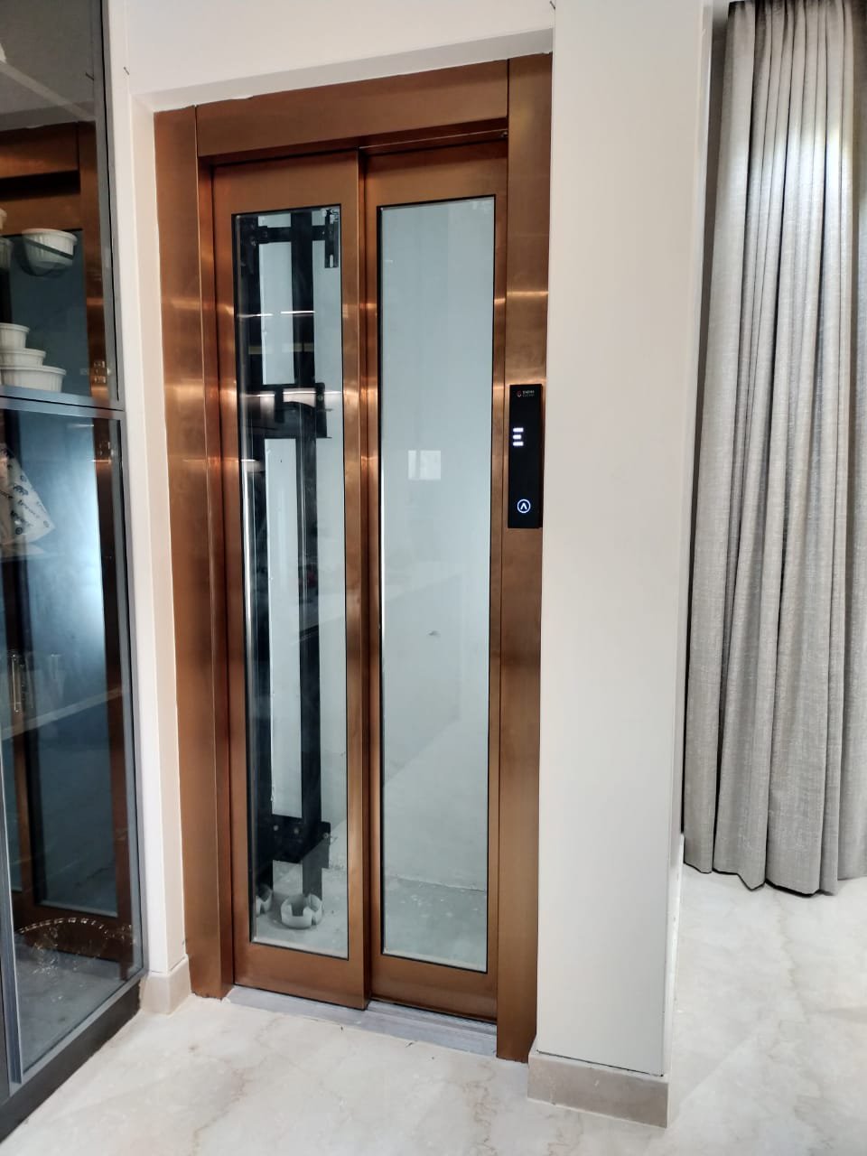 Premium Metallic Home Elevator Cabin Interior, home lifts by Dhrithi Infra
